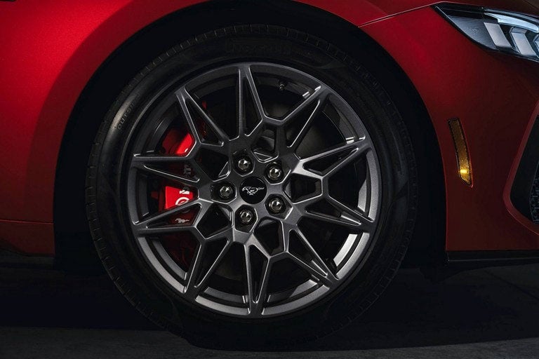 2024 Ford Mustang® model with a close-up of a wheel and brake caliper | Davis Ford Sales, Inc. in Fulton MS